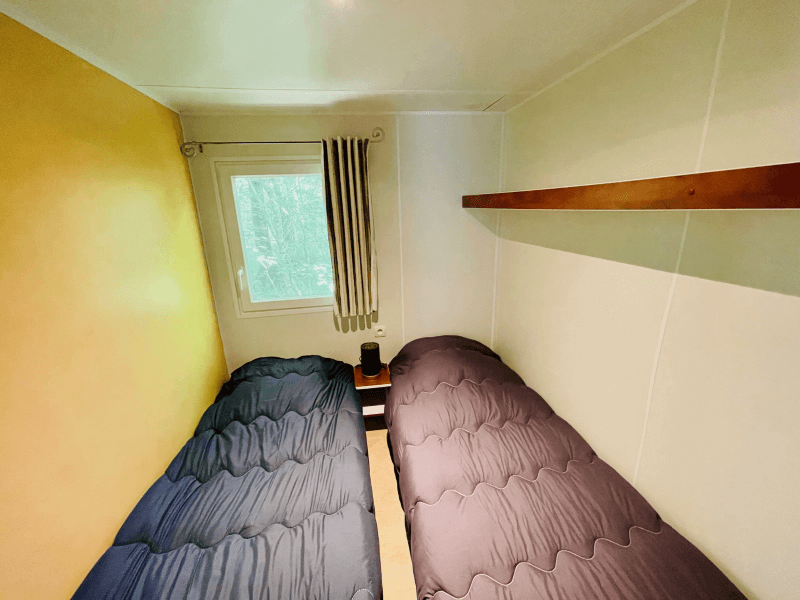 Chambre 2 lits séparés. Location Mobil-homes en Ariège, mobil-home Frêne confort 4 personnes